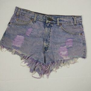 Vintage Levis 550 distressed jean shorts with raw